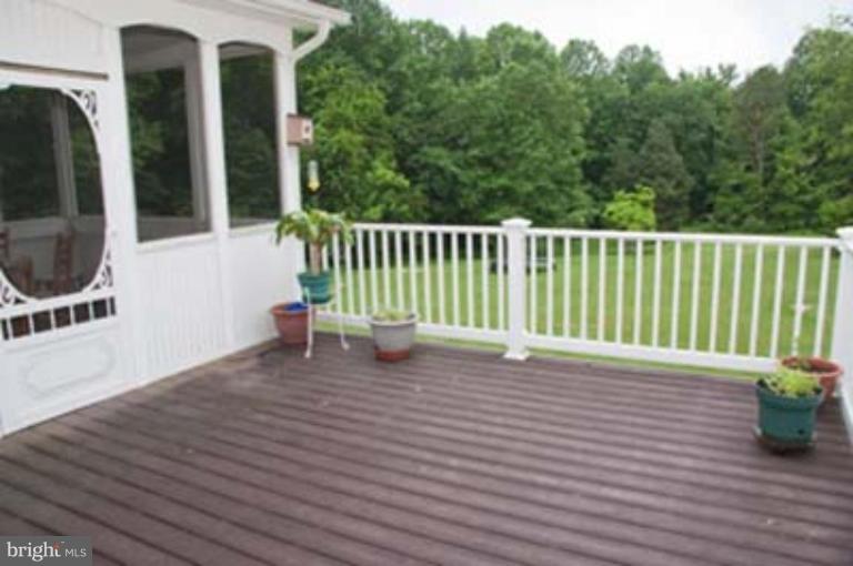 14616 Manor Road Phoenix, MD 21131 - Photo 28 of 30 a view of a chair and tables in the balcony