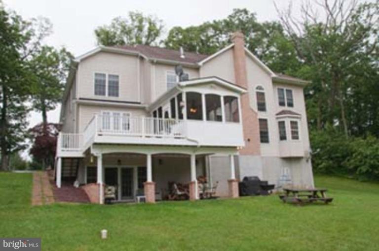 14616 Manor Road Phoenix, MD 21131 - Photo 30 of 30 a front view of a house with garden