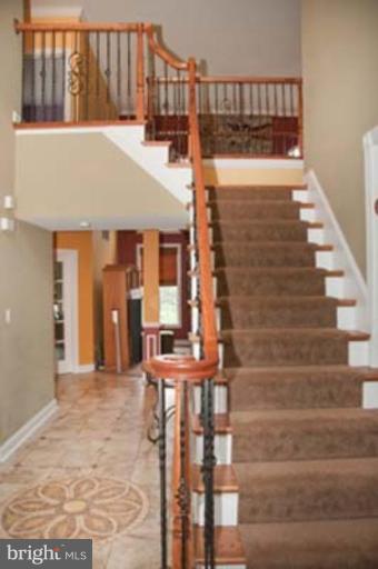 14616 Manor Road Phoenix, MD 21131 - Photo 4 of 30 a view of entryway and hall with wooden floor