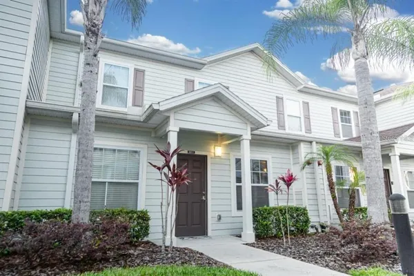 a front view of a house with a porch