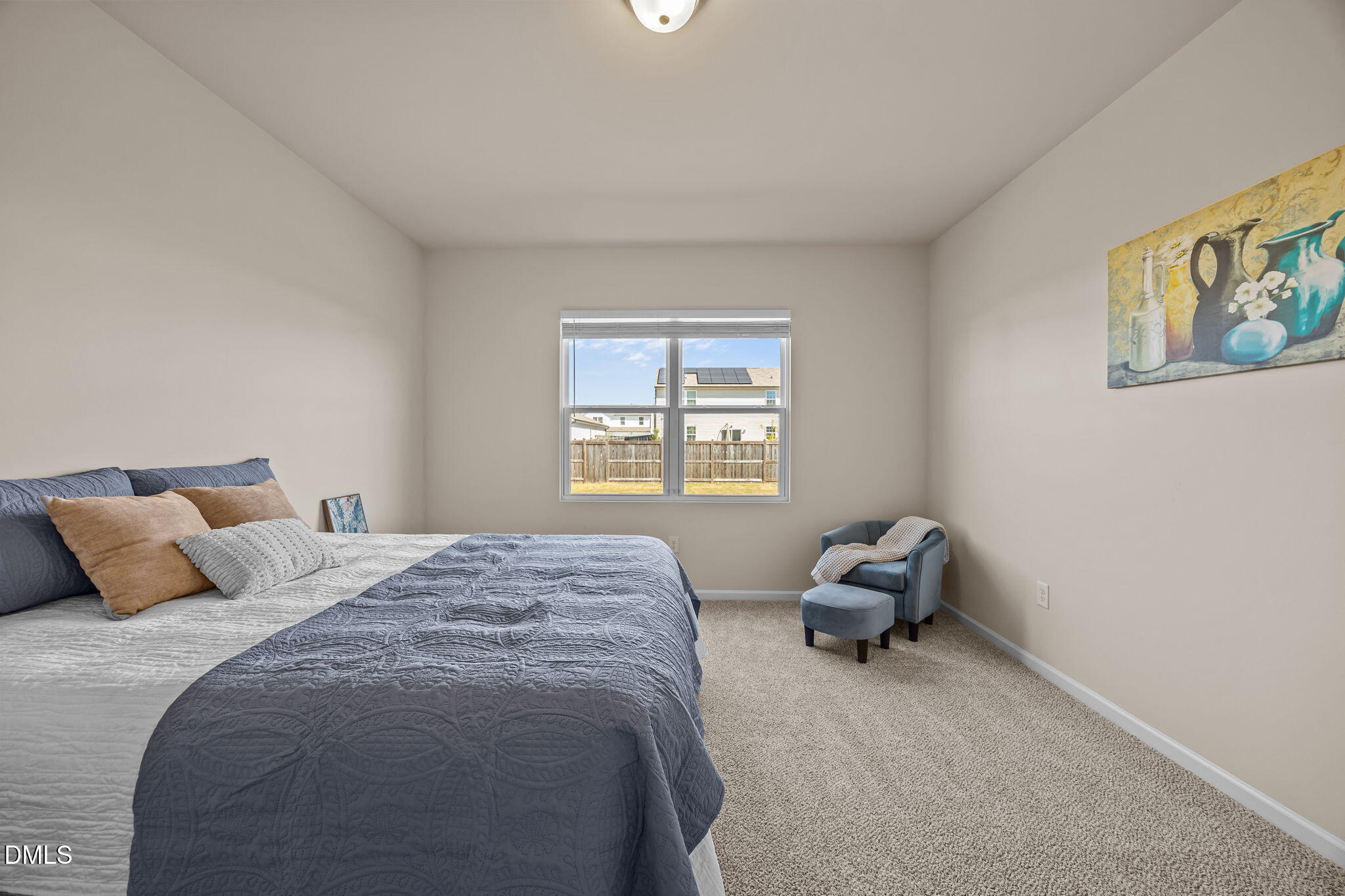3525 Polygon Place Raleigh, NC 27604 - Photo 14 of 30 a bedroom with a bed and a window