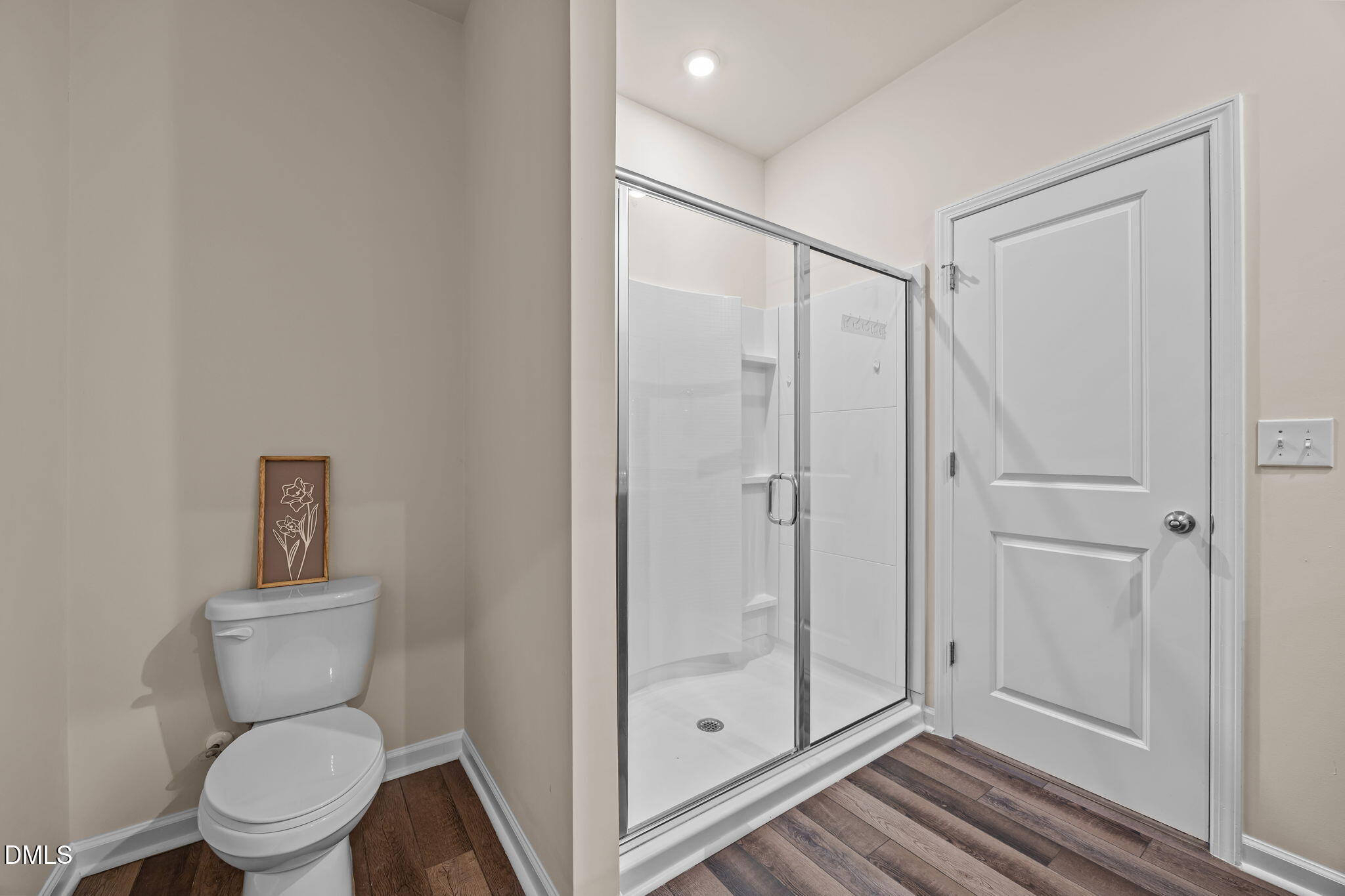 3525 Polygon Place Raleigh, NC 27604 - Photo 16 of 30 a bathroom with a toilet and a shower