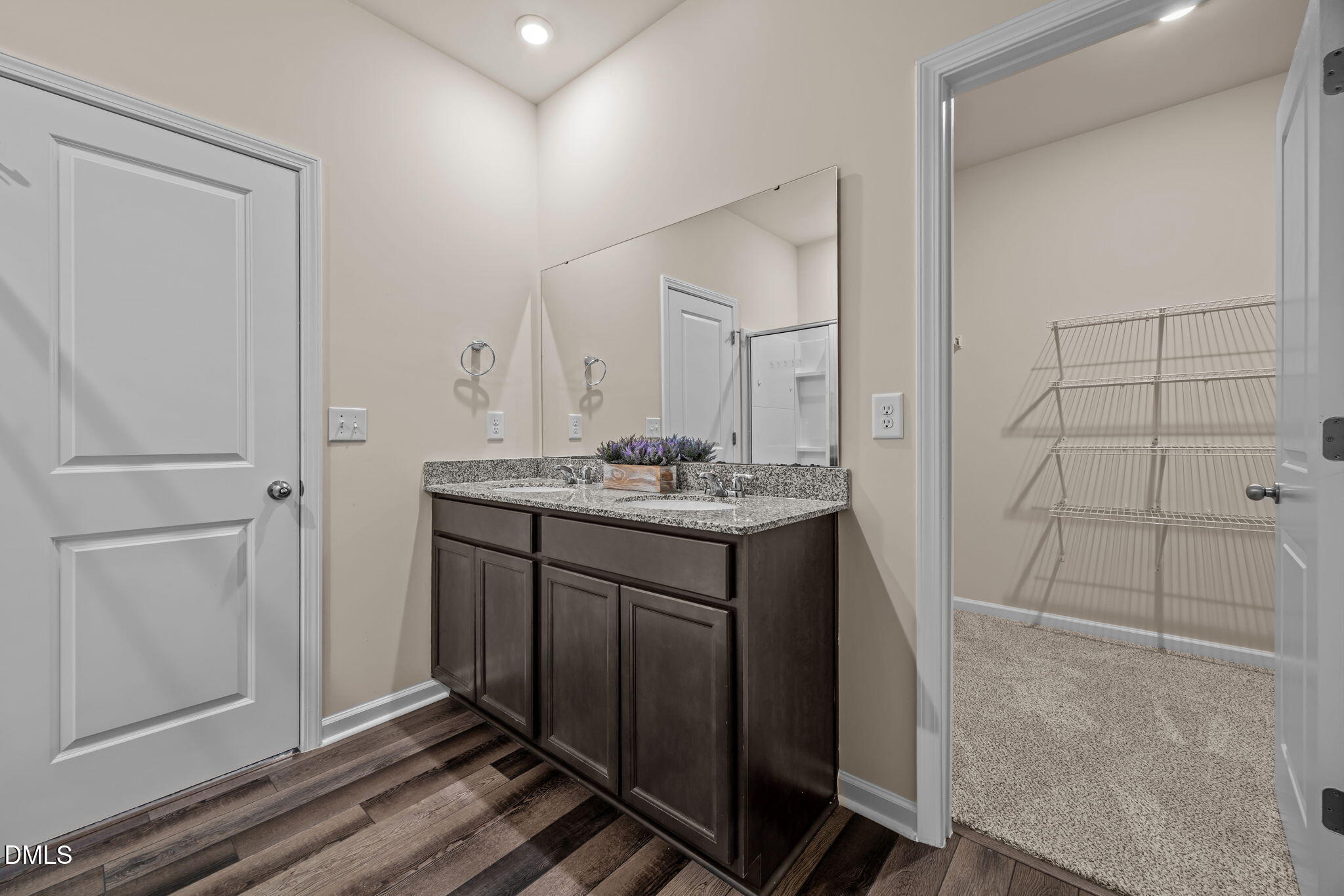 3525 Polygon Place Raleigh, NC 27604 - Photo 17 of 30 a bathroom with a sink and a mirror