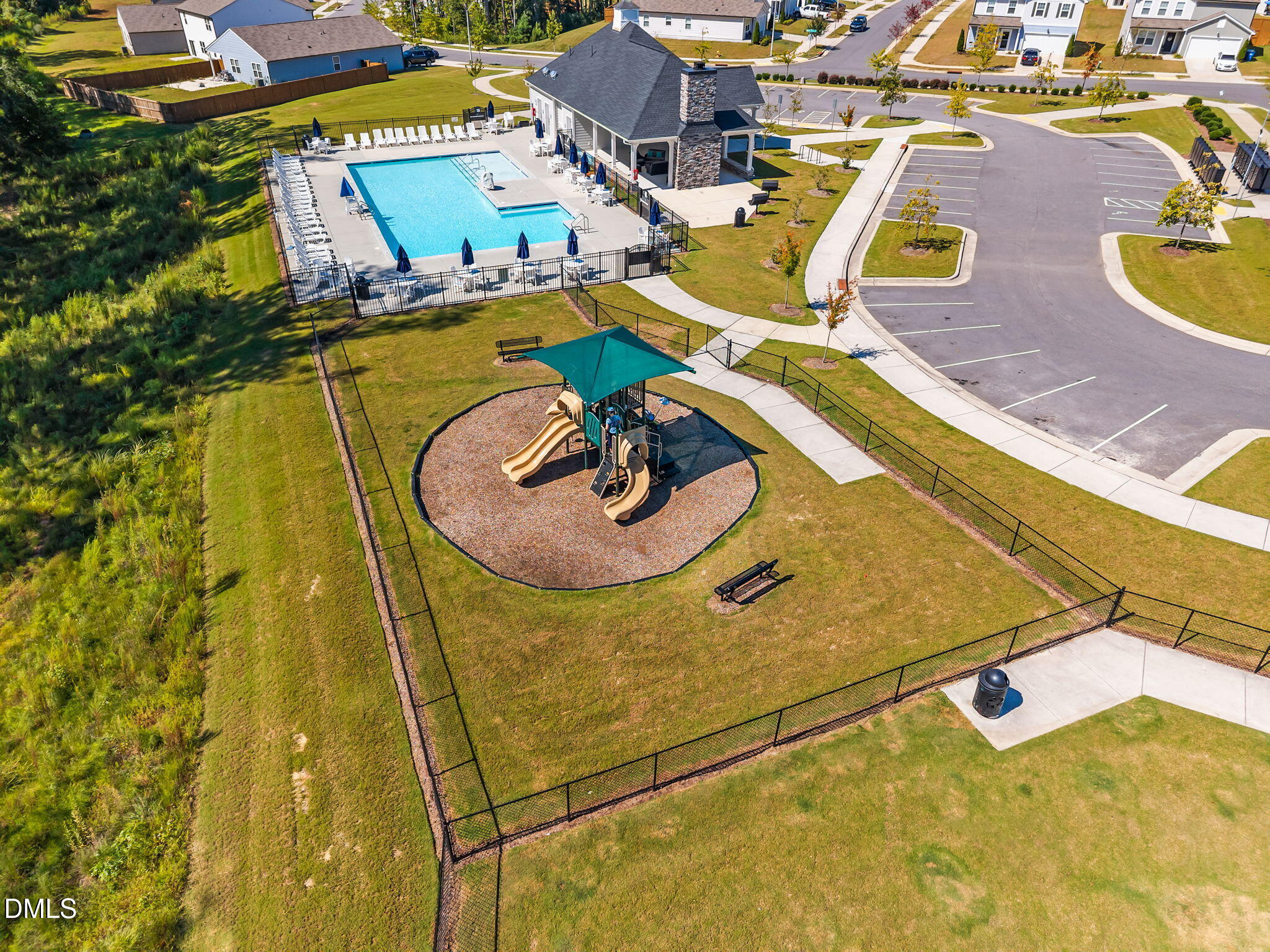 3525 Polygon Place Raleigh, NC 27604 - Photo 29 of 30 a view of a swimming pool with lounge chair