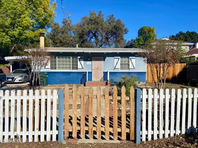 a front view of house with yard