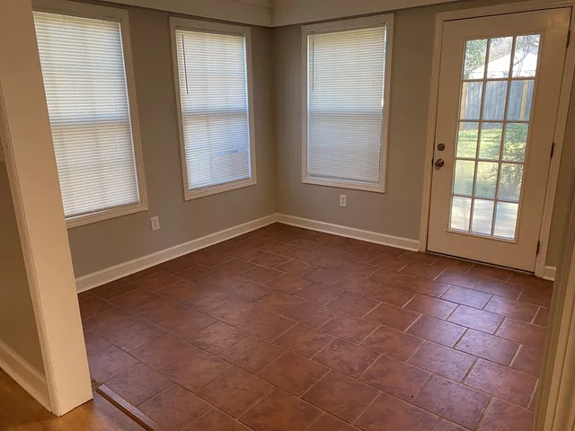 an empty room with windows