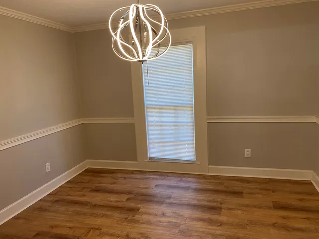 a view of a small space with racks on the wall