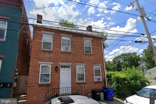 a brick building with a large windows