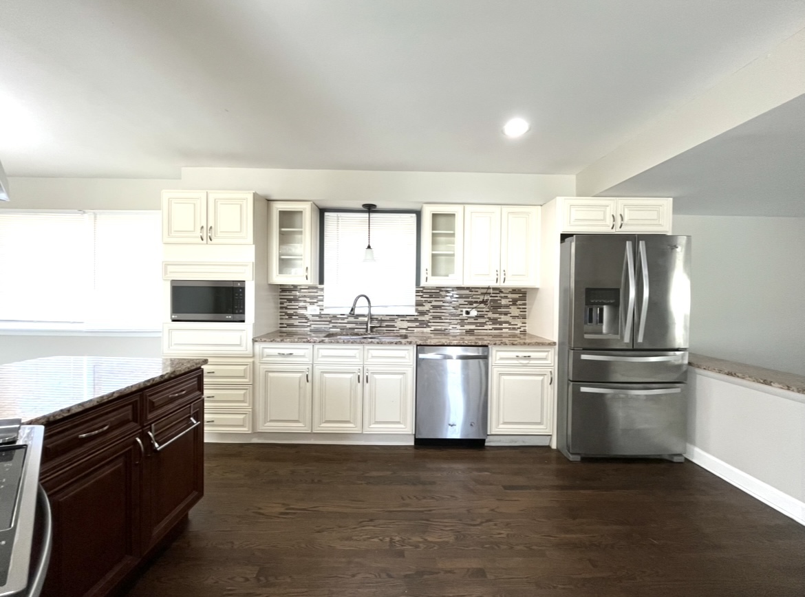 1308 191st Street Homewood, IL 60430 - Photo 3 of 15 a kitchen with a refrigerator stove top oven and sink