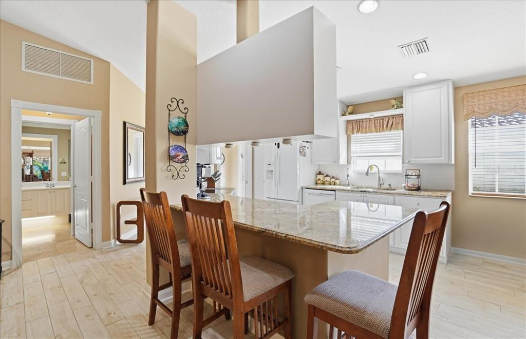 5546 Modena Place Sarasota, FL 34238 - Photo 14 of 67 a dining room with furniture and window