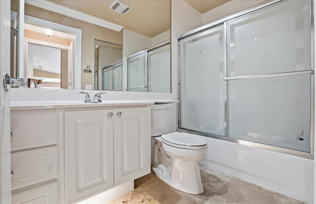 5546 Modena Place Sarasota, FL 34238 - Photo 27 of 67 a bathroom with a sink a toilet and shower