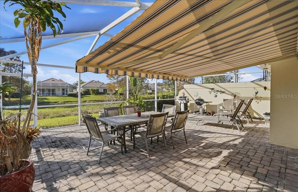 5546 Modena Place Sarasota, FL 34238 - Photo 31 of 67 a view of a backyard with sitting area furniture and garden