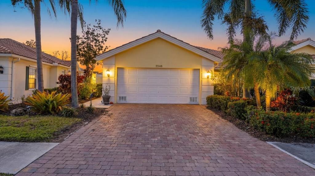 5546 Modena Place Sarasota, FL 34238 - Photo 38 of 67 a view of a house with a yard