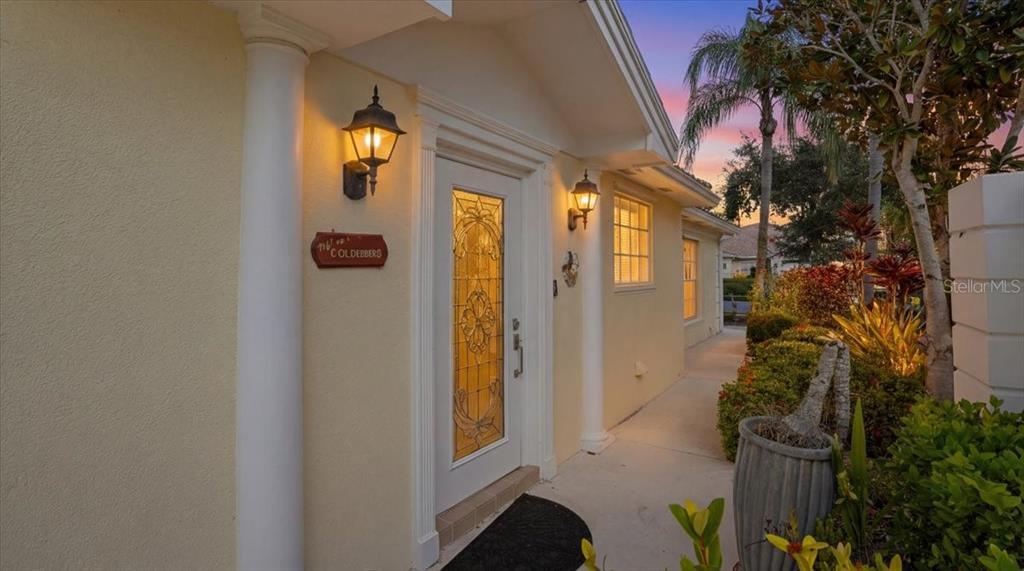 5546 Modena Place Sarasota, FL 34238 - Photo 41 of 67 a view of a entryway door of the house