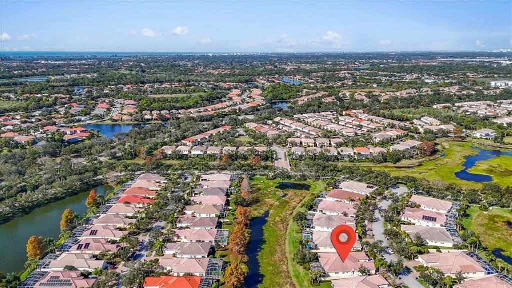 5546 Modena Place Sarasota, FL 34238 - Photo 53 of 67 an aerial view of residential houses with outdoor space