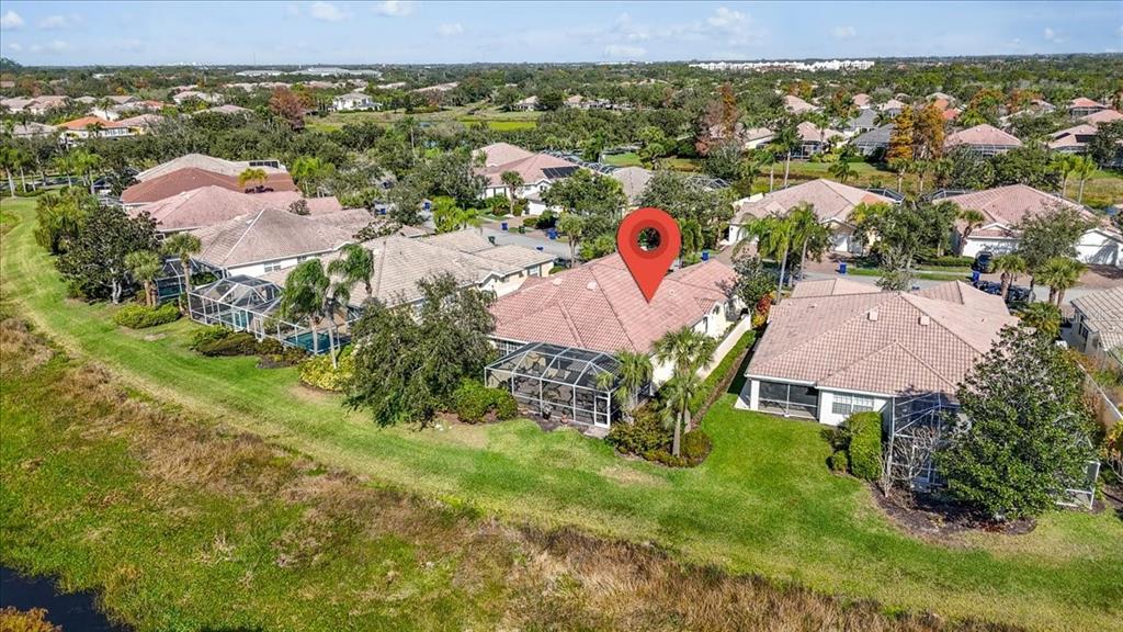 5546 Modena Place Sarasota, FL 34238 - Photo 55 of 67 an aerial view of residential houses with outdoor space