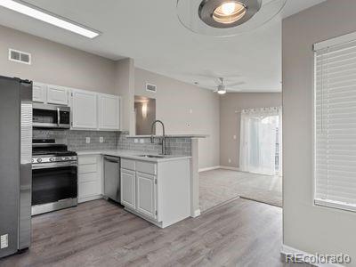 8304 Pebble Creek Way, Unit 201 Highlands Ranch, CO 80126 - Photo 4 of 16