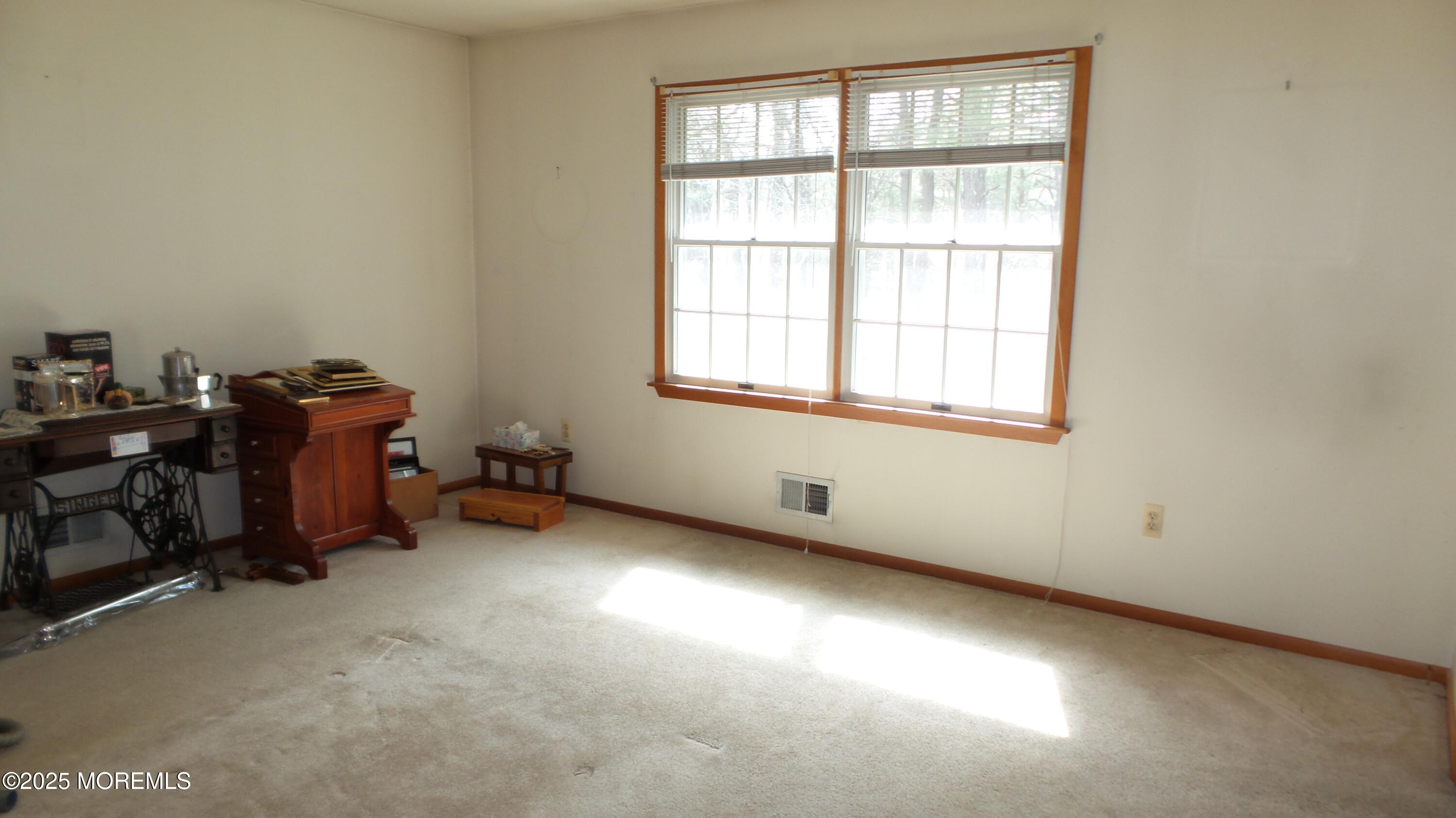 186 Cherry Quay Road Brick, NJ 08723 - Photo 12 of 20 an empty room with windows