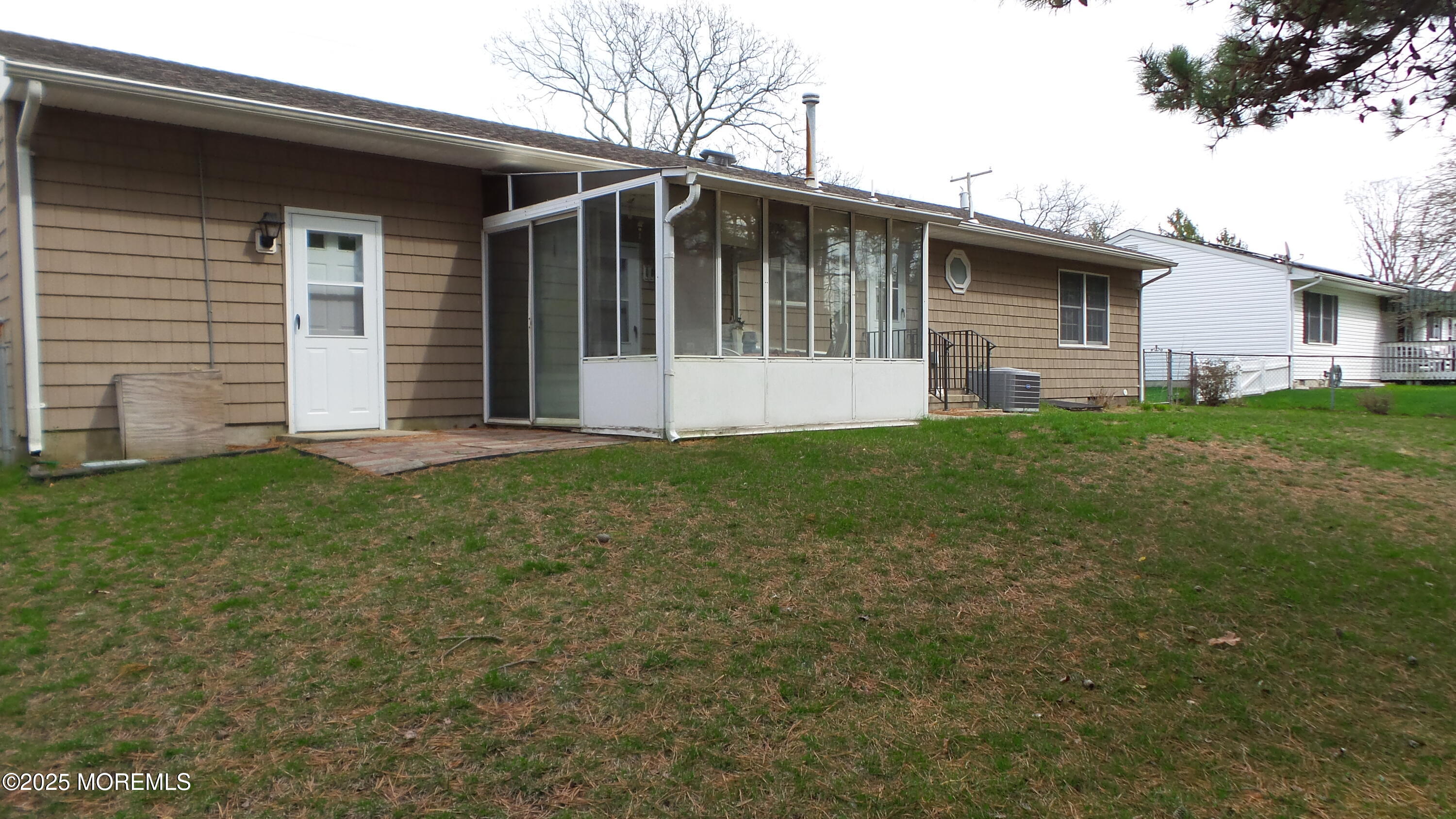 186 Cherry Quay Road Brick, NJ 08723 - Photo 15 of 20 a view of a house with a yard