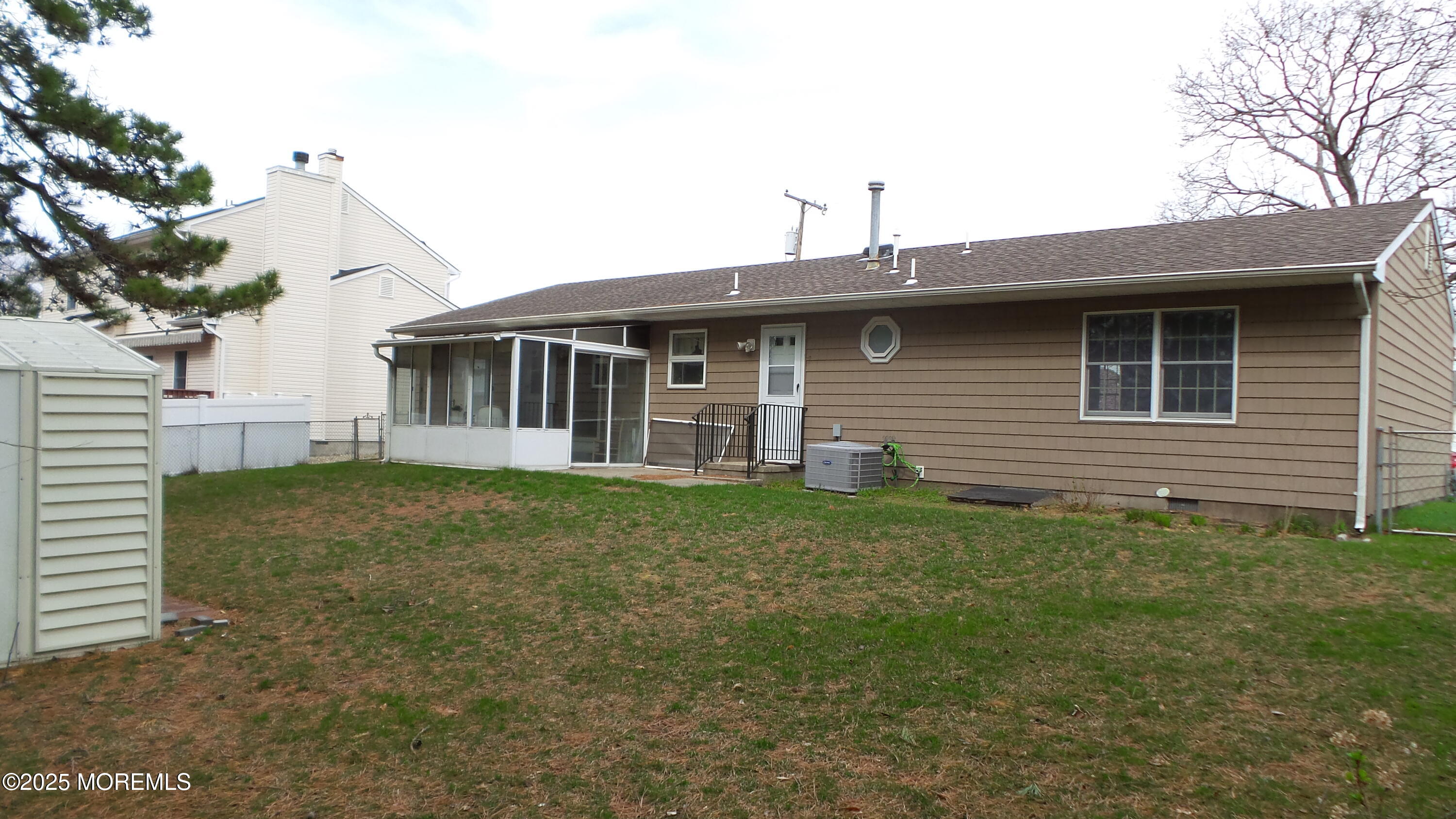 186 Cherry Quay Road Brick, NJ 08723 - Photo 16 of 20 a view of a house with a backyard