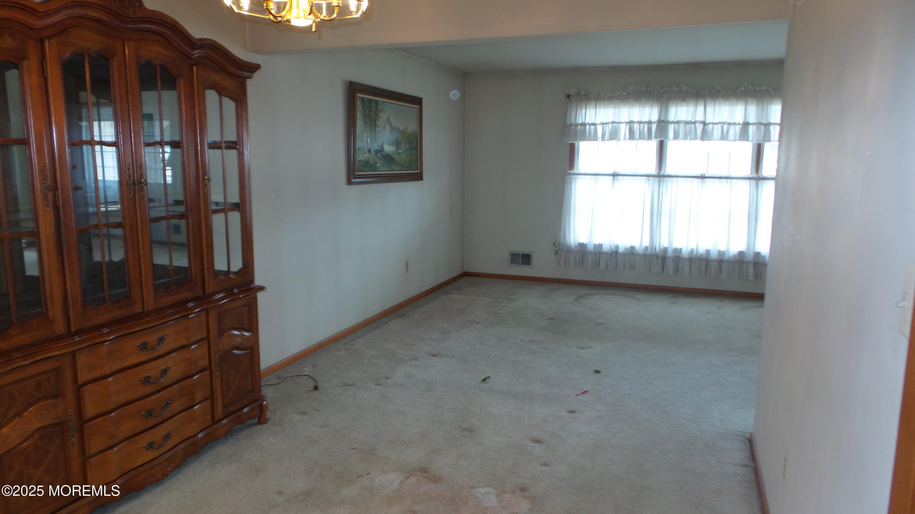186 Cherry Quay Road Brick, NJ 08723 - Photo 7 of 20 an empty room with windows
