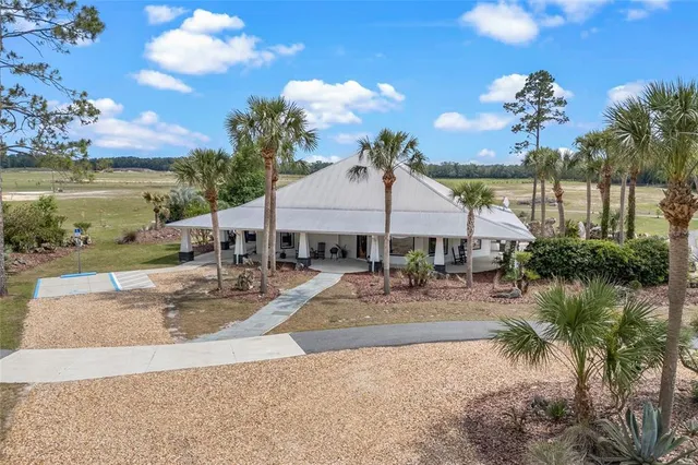a house view with a garden space