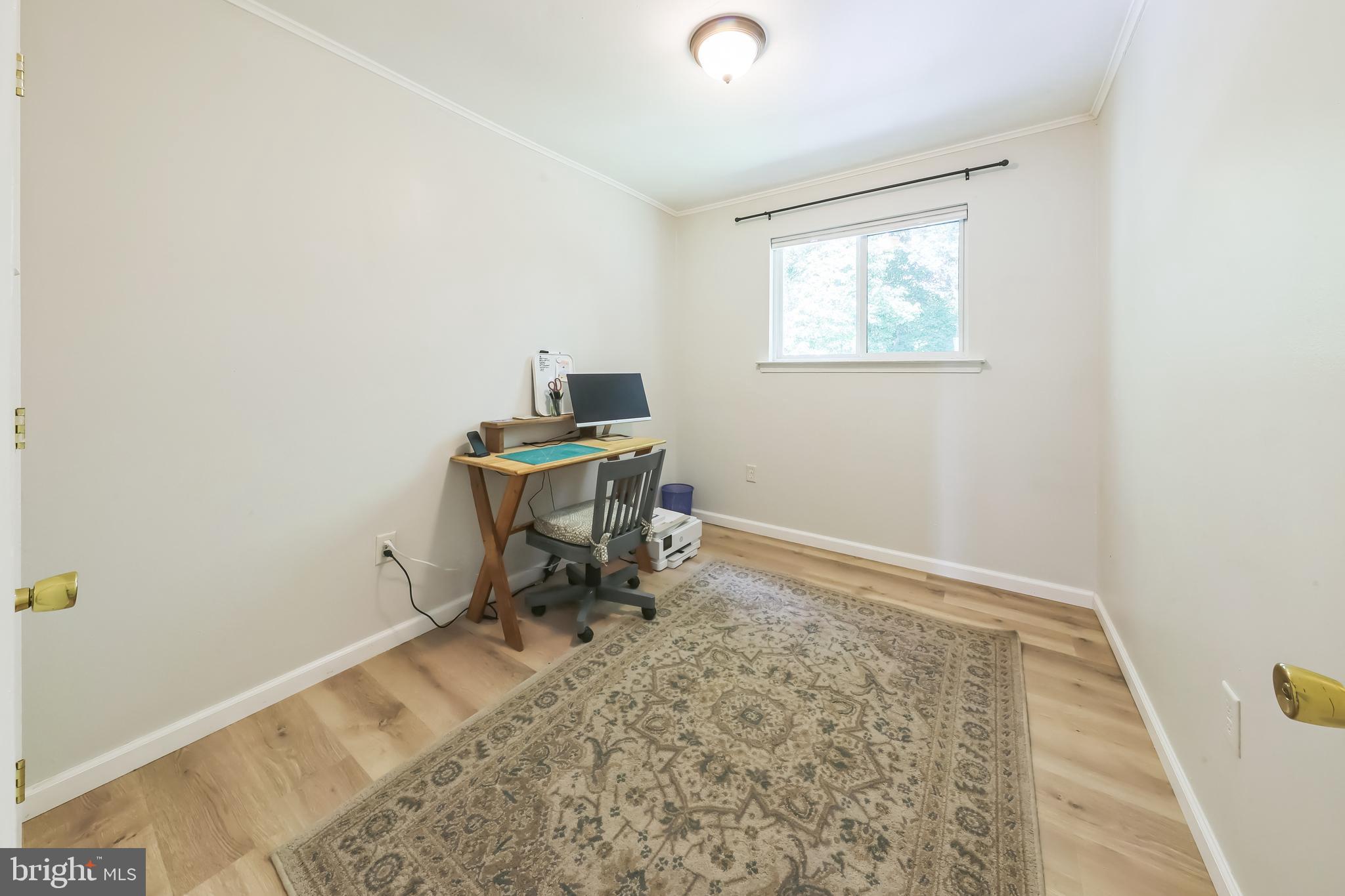 852 Hasting Court Newark, DE 19702 - Photo 18 of 29 a workspace with furniture and a window
