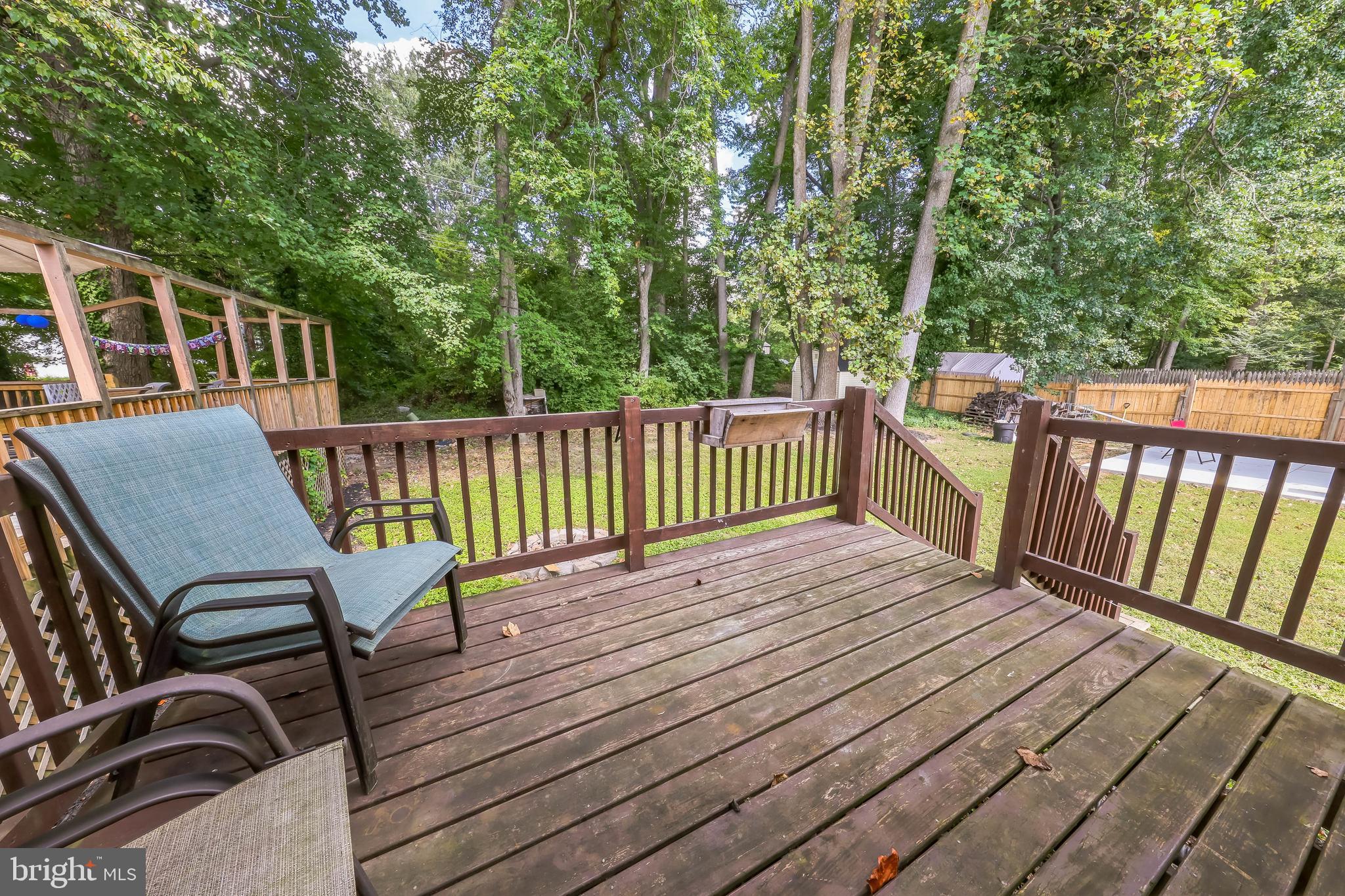 852 Hasting Court Newark, DE 19702 - Photo 28 of 29 a view of a wooden deck with chairs