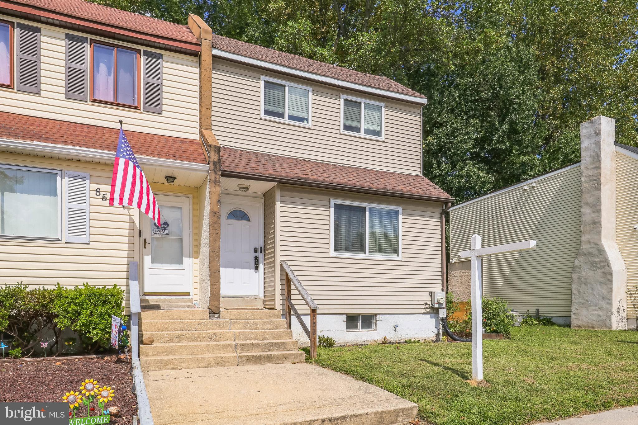 852 Hasting Court Newark, DE 19702 - Photo 3 of 29 a front view of a house with a yard