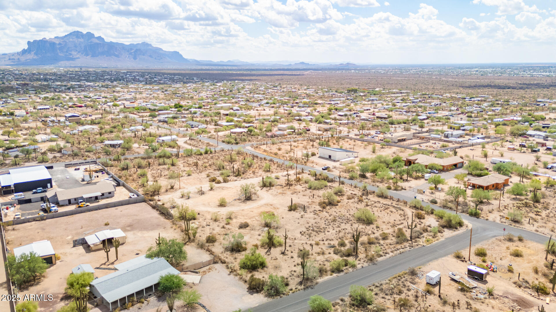 2800 West Canyon Street, Unit 47 Apache Junction, AZ 85120 - Photo 11 of 25 an aerial view of residential building and city