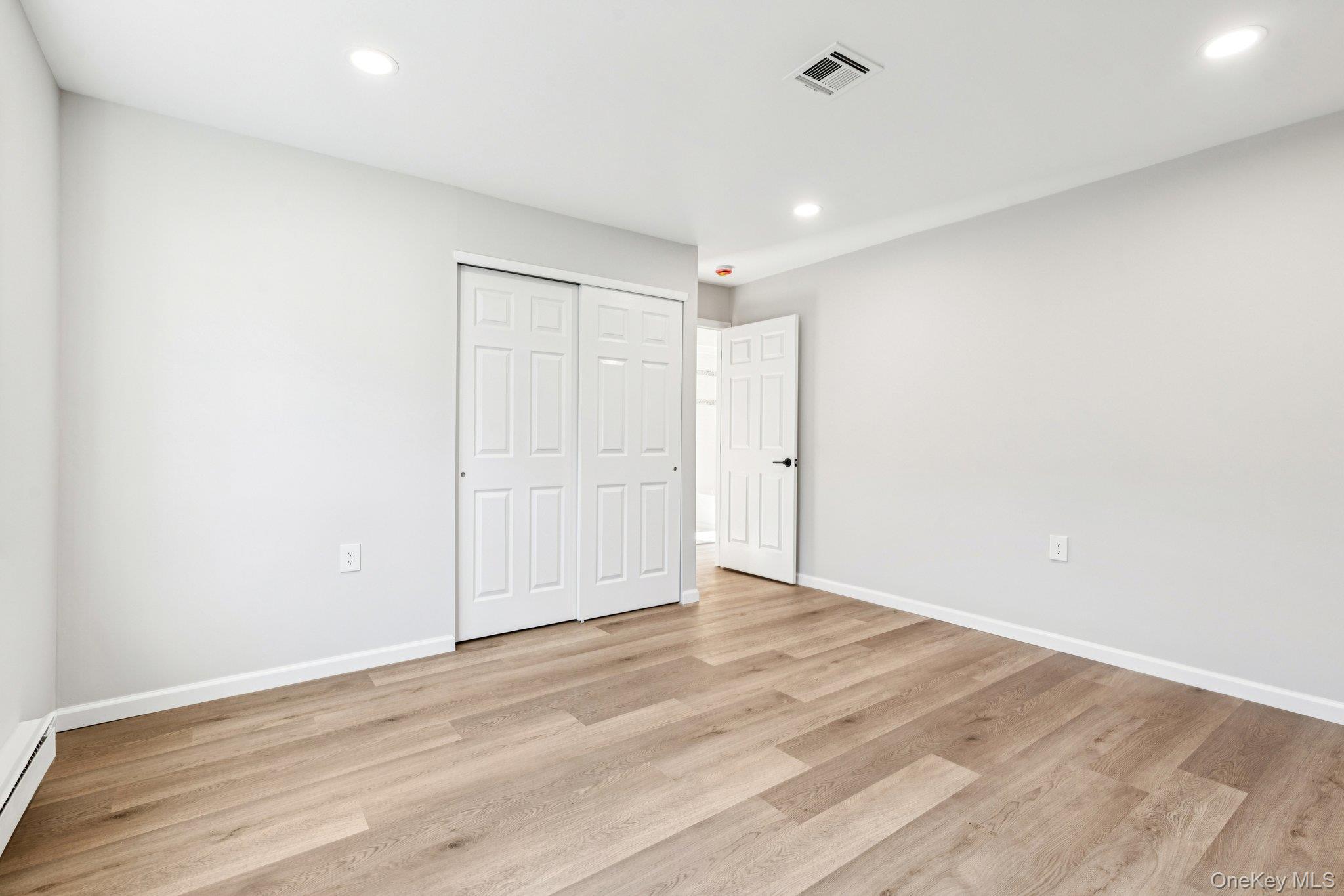 195 Canterbury Drive Ridge, NY 11961 - Photo 18 of 26 a view of an empty room