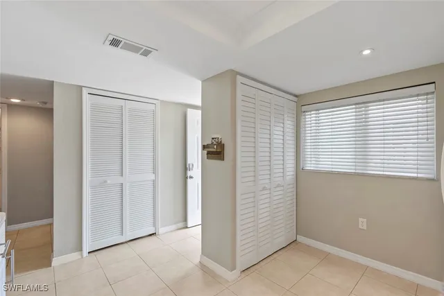 a view of an empty room with window