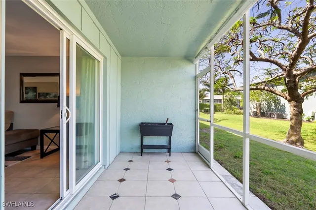 a view of an entryway with garden area