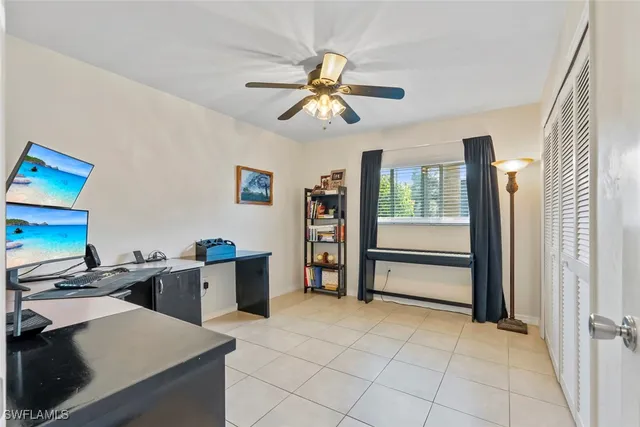 a view of a kitchen with furniture and windows