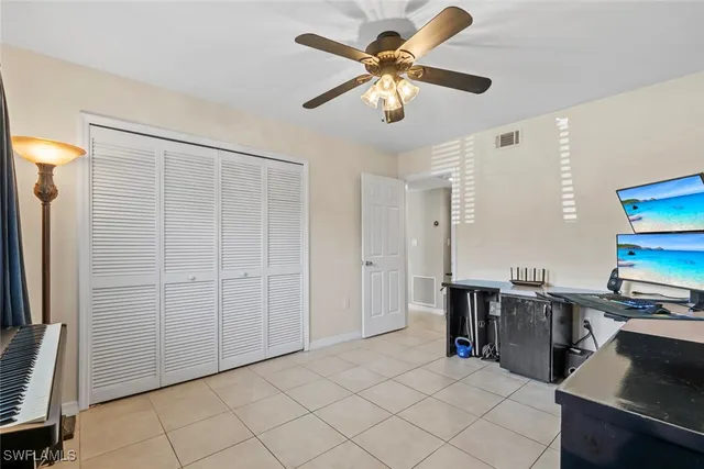a view of a workspace with furniture