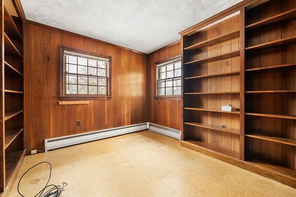 a view of a room with a wooden floor