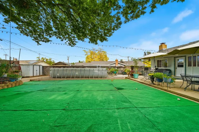 a view of a house with a big yard