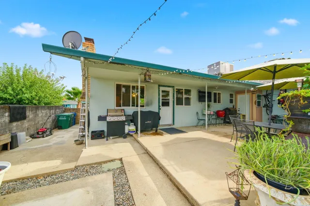 a view of a dinning room with furniture and a table