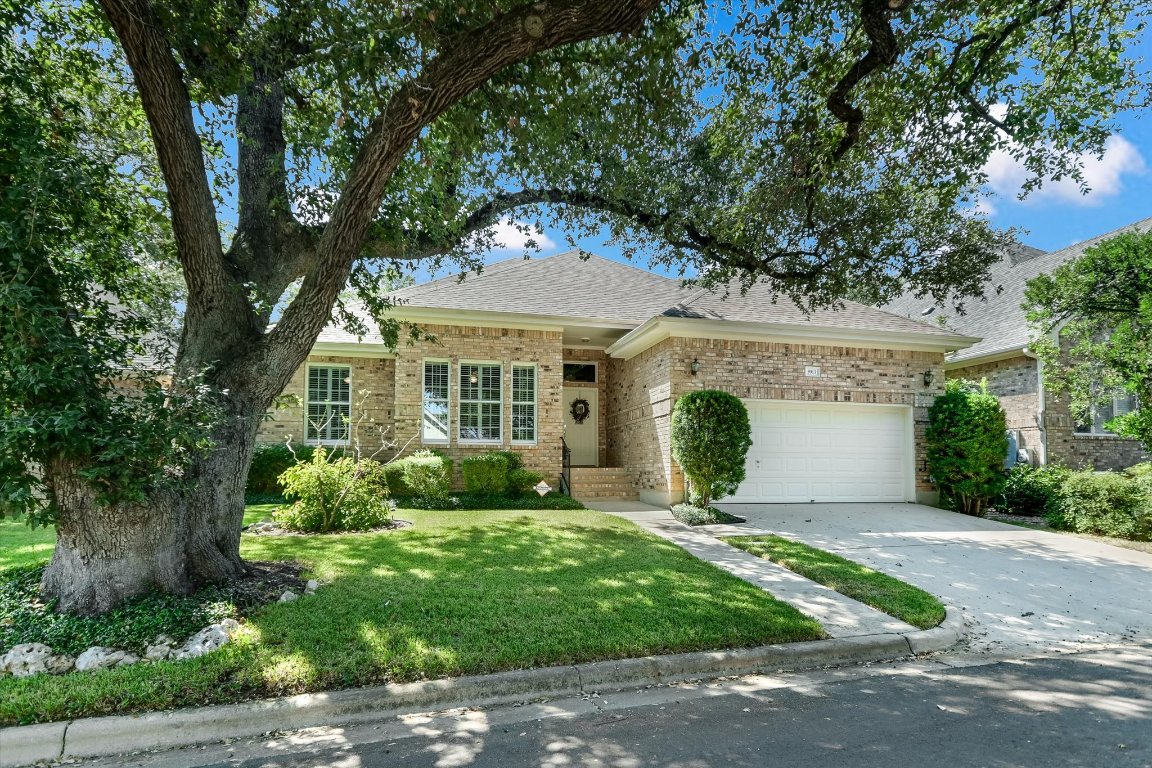 3913 Myrick Drive Austin, TX 78731 - Photo 1 of 1 a front view of a house with garden