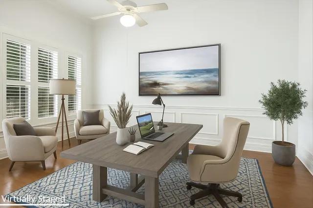 a view of a dining room with furniture window and outside view
