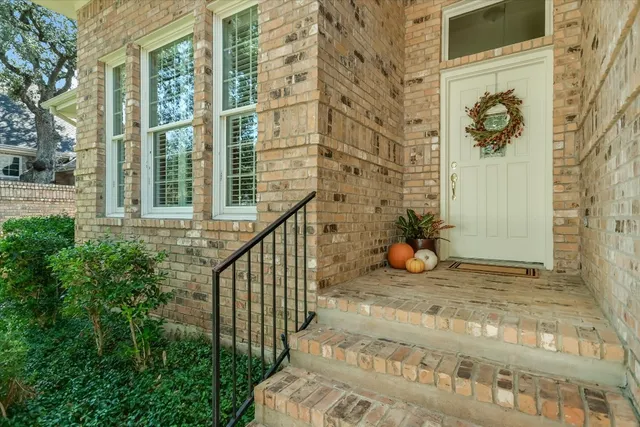 a view of a porch with a floor to ceiling window