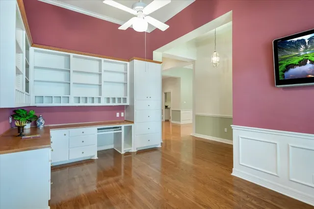 a view of kitchen with furniture and flat screen tv