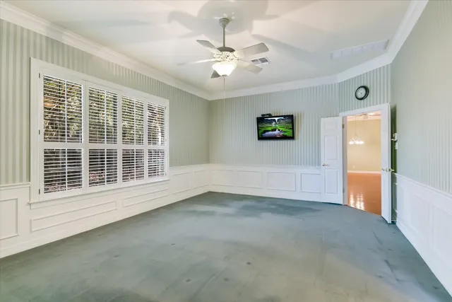 a view of an empty room with a window