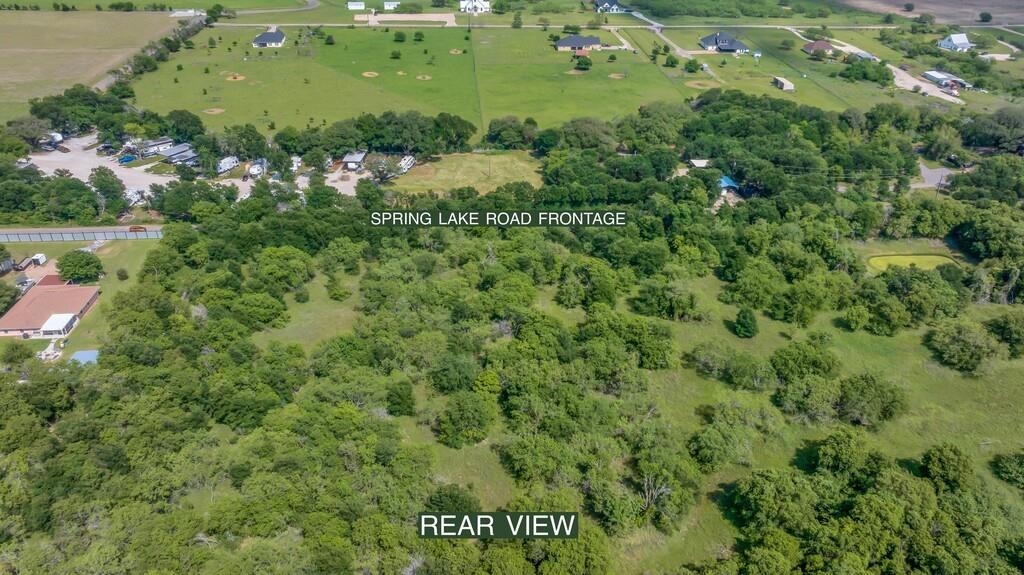 Tbd Spring Lake Road, Unit LOT 1 Elm Mott, TX 76640 - Photo 3 of 5 an aerial view of a residential houses with outdoor space and trees all around