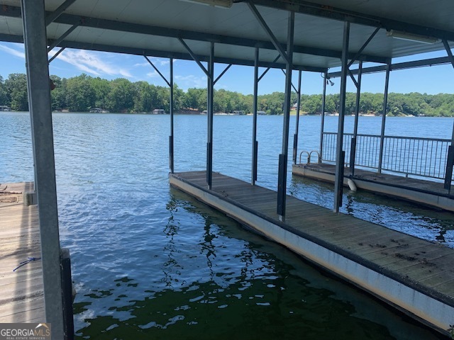 0 Harold Whelchel Road Gainesville, GA 30506 - Photo 26 of 30 a view of a street with a bench