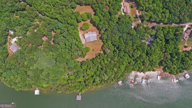 0 Harold Whelchel Road Gainesville, GA 30506 - Photo 5 of 30 a view of a wooden fence and flowers