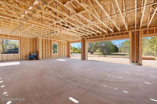 a view of a room with wooden walls