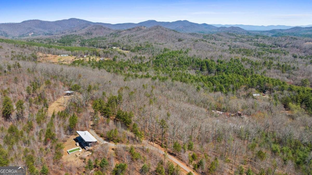 40 B Synacia Road Mineral Bluff, GA 30559 - Photo 7 of 17 a view of mountains in middle of forest