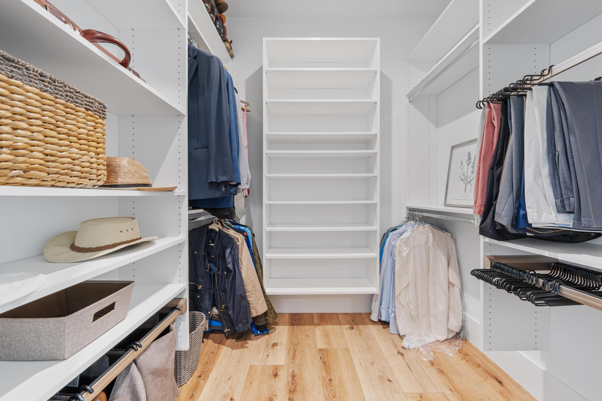 19993 Loxahatchee Pointe Drive Jupiter, FL 33458 - Photo 18 of 42 a view of walk in closet with clothes and shoes