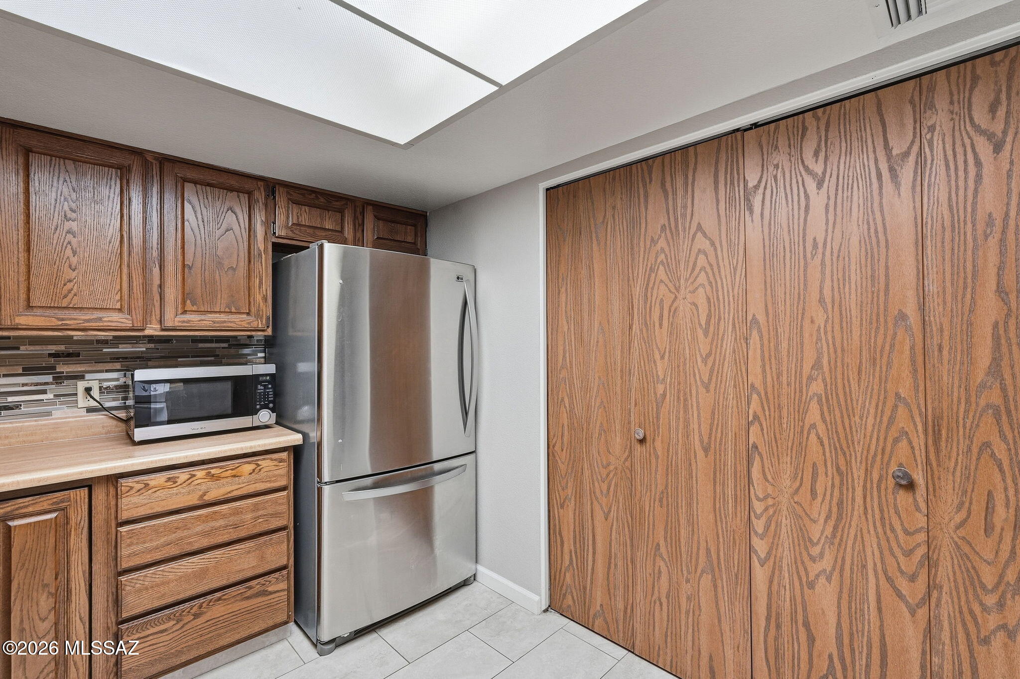 1949 North Swan Road, Unit 31 Tucson, AZ 85712 - Photo 9 of 33 Double sink, dishwasher, microwave and stainless steal fridge too!